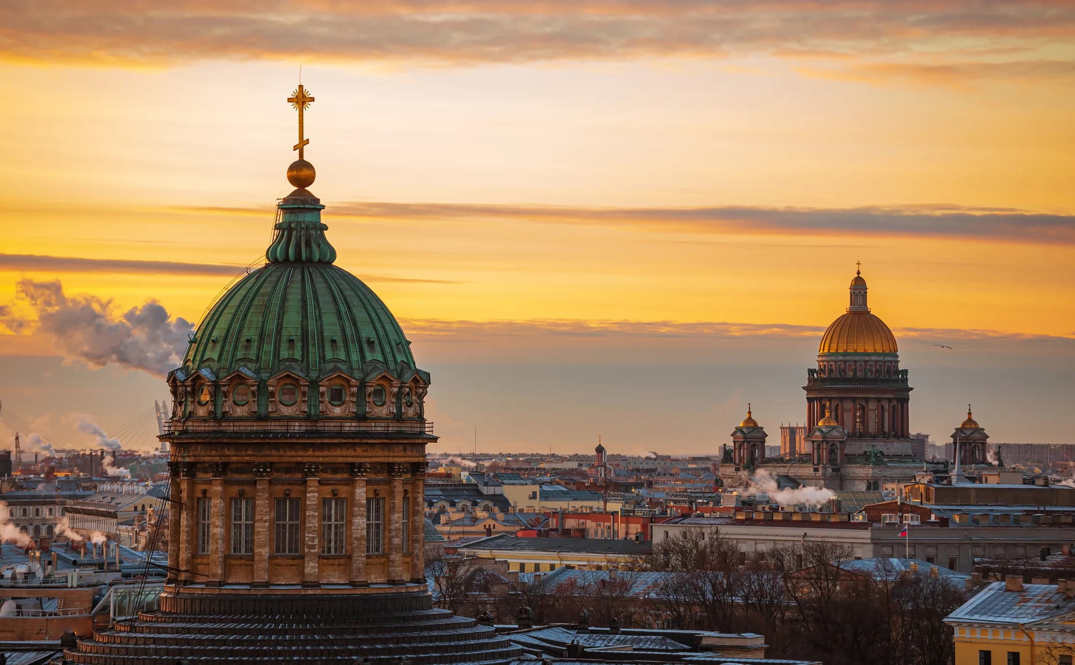 Sunset over St Petersburg: the dome of Kazan Cathedral and St Isaac's beyond